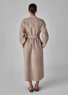 Full length coat in luxurious double faced wool cashmere. Tonal taupe contrast. Self Belt. Side seam pockets. 90% Wool, 10% Cashmere Taupe 6038BWCS-CORE Generous fit Total length xs/s = 52" M/L = 53" Model is 5'9" wears a size XS/S Wool Wrap Coat, Full Length Coat, Wrap Coat, Denim Shoes, Wool Coat, Dress Skirt, Sweater Shirt, Shirts Tops, Knitted Sweaters