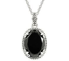 Make a stunning first impression with this dazzling gemstone necklace. From Suspicion® Marcasite Jewelry. Black Oval Jewelry With Gemstone Accents, Black Oval Gemstone Accent Jewelry, Elegant Onyx Stone Jewelry, Elegant Black Necklace With Stones, Elegant Onyx Oval Pendant Jewelry, Elegant Onyx Necklace With Stones, Elegant Onyx Stone Necklace, Marcasite Jewelry, Chic Office