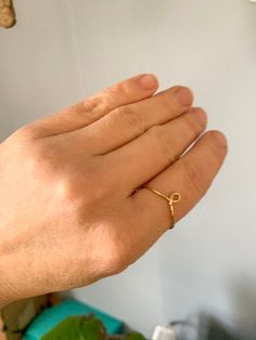 "Knot ring, Gold Ring, Silver Ring, Stacking Ring, Dainty Ring This amazing ring is so cute and can be worn everyday by itself or stacked with other rings! It comes in 14k Gold Fill, Rose Gold Fill, or Sterling Silver. Choose your metal and ring size at checkout. I can make any size you need from small to larger sizes! If you don't see your size as an option, select the option \"other\" and type it in. Please message me with any questions. Shop the stacking look by adding these: https://www.etsy Yellow Gold Hoop Rings As Gift, Gold Infinity Stackable Rings As Gift, Gold Infinity Ring As Gift, Minimalist Gold Crystal Gift Ring, Gold Minimalist Infinity Midi Rings, Dainty Hoop Promise Ring, Gold Infinity Ring For Everyday, Minimalist Crystal And Metal Ring As A Gift, Gold Open Band Midi Rings As Gift