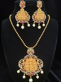 "Handmade Indian Jewelry item * Stunning Hand made Traditional jewelry set. * Pendant and Earrings are a set. * Packed in a box, Ideal For GiftingOn Request, We Can Add A Custom Message For Your Loved One (At No Additional Cost) :) * Gold Color is Matte gold tone, which has a copper hue as opposed to bright gold. * Chain Length: 18\"( Price not included in the pendent set.) Each chain has different price PLS. NOTE: Chains shown in the picture are for your reference only. They are not included in Temple Jewelry Pendant With Stones, Temple Jewelry Earrings With Stones As Gift, Temple Jewelry Earrings With Stones For Gift, Festive Temple Jewelry Necklace With Stones, Festive Temple Necklace With Stones, Festive Earrings With Stones As Gift, Festive Pendant Jewelry Sets With Matching Earrings, Temple Jewelry Earrings With Stones For Celebration, Temple Jewelry Sets With Stone Setting For Celebration