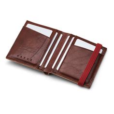 "Limited edition men's designer leather wallet.  Eco-friendly and unique, this leather wallet is made from high-grade leather pieces that are usually discarded during large manufacturing projects. Only a few of these Leather Wallets are made from each piece, so yours will be a true original. When we designed this wallet, it was our goal to balance minimal size with functionality. Although this is the bigger version of The wallet, it is still minimal and compact  The wallet is durable, lightweigh Modern Leather Wallets For Daily Use, Modern Leather Wallet For Daily Use, Modern Brown Leather Wallet, Modern Leather Wallets With Leather Lining, Modern Leather Wallet With Leather Lining, Modern Leather Wallet, Womens Wallet, Upcycled Leather, Brown Leather Wallet