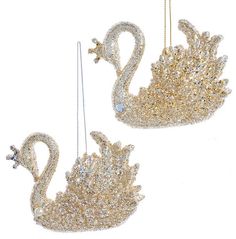 Glittered ornaments shaped like swans. This picture shows both options. Swan Ornaments, Rice Lights, Cascade Lights, Christmas Tree Trimming, Swan Decor, Picture Frame Ornaments, Peacock Pearls, Tinsel Tree, Cluster Lights