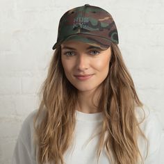 Dad hats aren't just for dads. This one's got a low profile with an adjustable strap and curved visor. • 100% chino cotton twill • Green Camo color is 35% chino cotton twill, 65% polyester • Unstructured, 6-panel, low-profile • 6 embroidered eyelets • 3 ⅛” (7.6 cm) crown • Adjustable strap with antique buckle • Blank product sourced from Vietnam or Bangladesh Texas Butter, Camo Hat, Mom Hats, Camo Hats, Classic Hats, Camo Colors, Dad Caps, Embroidered Hats, Green Camo