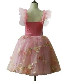 A beautiful pre-professional tutu for the role of Rose Buds or Flowers in Nutcracker's Waltz of the Flowers. This Romantic tutu features a pink velvet bodice with a V cut in the front and a nude insert. The bodice is decorated with multiple flower appliques. The Romantic pink tutu skirt is as well decorated with flowers. Custom made. Delivery time: 5 to 6 weeks $ 250 Pink Fairy Style Tutu Dress With Ruffles, Pink Tulle Tutu Dress For Dance, Pink Ballet Tutu Dress In Tulle, Pink Tulle Tutu Dress For Costume, Pink Fitted Ballet Tutu Dress, Pink Ballet Tutu Dress, Pink Ballet Tutu Dress With Tulle Skirt, Fitted Pink Balletcore Tutu Dress, Pink Fitted Balletcore Tutu Dress