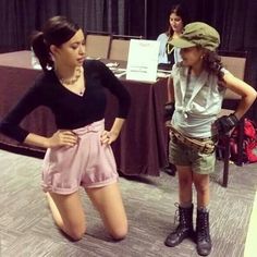 two young women standing next to each other