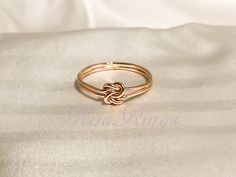 All rings are tailor-made according to the size requested by the customer. No returns or exchanges Fast Processing Time: It will take me 1 -3 days to ship out your item. Details : - Wire diameter: 1 mm Material: 14K Rose gold filled round+round wire: I offer this ring in other STYLES: Six styles combination: https://etsy.me/3byUsbK 14k gold filled round+round wire: https://etsy.me/3quEMKY Sterling silver round+round wire : https://etsy.me/3vgez6z 14k gold filled round+twist wire: https://etsy.me 14k Rose Gold Filled Ring, Round Round, Double Knot, Textured Ring, Knot Ring, Gold Filled Ring, Cross Ring, Sterling Silver Cross, Silver Cross