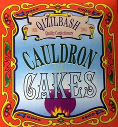 an advertisement for cauldron cakes on the side of a red wall with colorful lettering