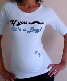 a woman wearing a t - shirt that says if you like it, it's a boy