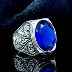 Men Blue Stone Ring , Engraved Sapphire Stone Ring , Turkısh Handmade Ring , Ottoman Style Ring , 925k Sterling Silver Ring , Gift For Him ★Item Details * Gender : Male / Female * Material : 925K Sterling Silver * Total weight : 19 Grams * Gemstone : Sapphire Stone ✔ Ready to Ship in 1-2 Business Days .. ✔ Shipped to the Worldwide 1-5 business days with free shipping... ✔ The product will be sent to you with a handmade wooden box to avoid any damage during shipping... ✔ Visit our store, browse o Formal Blue Engraved Signet Ring, Blue Engraved Hallmarked Ring For Anniversary, Formal Blue Engraved Ring Hallmarked, Formal Blue Engraved Hallmarked Ring, Blue Engraved Ring With Polished Finish For Formal Occasions, Blue Engraved Sterling Silver Rings, Formal Blue Engraved Ring With Polished Finish, Classic Blue Engraved Ring With Polished Finish, Oval Blue Engraved Ring