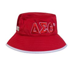 a red bucket hat with the letters eeza on it's brimming