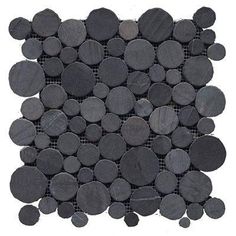 black stone mosaic tile with circles and dots on white background for use in interior or exterior design