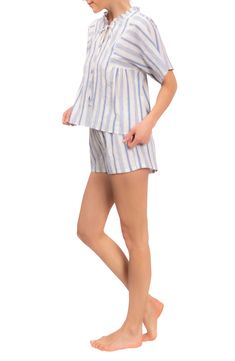 Tonal-striped cotton seersucker keeps you cool on the hottest nights in short pajamas featuring a floaty top trimmed in a mini ruffle. Top has split neck with ties; short sleeves 100% cotton Machine wash, tumble dry Made in the USA of imported fabric Black Owned/Founded Cotton Pajama Shorts, Fall Stripes, Short Pajamas, Striped Pyjamas, Night Suit, Fabric Black, Pajama Shorts, Pj Sets, Ruffle Top