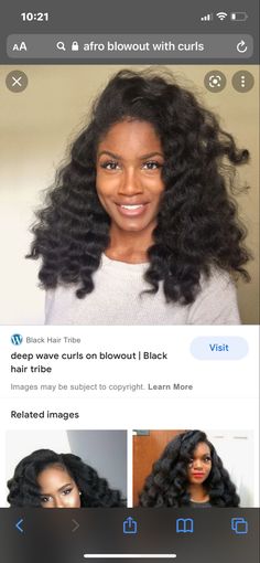 an instagramting photo of a woman with curly hair on her cell phone screen