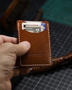 The "Clam 2.0" - a refined, minimalist card wallet that seamlessly fits into both front or back pocket. This design is a subtle evolution of the original "Clam" wallet, featuring smoother curves and reduced card exposure for a sleeker, more sophisticated profile. **Key Features - **Capacity Holds up to 6 cards and some cash, providing just the right amount of space for your essentials without bulk. - **Design The Clam 2.0 is designed with meticulous attention to detail, offering a modern twist o Luxury Leather Versatile Wallet, Luxury Everyday Leather Wallets, Luxury Soft Leather Wallet, Luxury Classic Textured Leather Wallets, Luxury Artisan Leather Wallet, Luxury Artisan Wallets For Everyday Use, Minimalist Card Wallet, Minimalist Card, Minimalist Cards