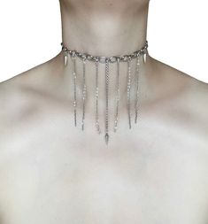 Pendulum Chain Choker 🖤 This unique necklace is made with a variety of silver chains in different thicknesses, creating texture. The dangling drop chains and pendulum charms add a touch of drama. 🖤 Only one available as I like to make one of a kind pieces so that you have a unique, standout, rare, special piece that you can't find anywhere else. Care Instructions: Keep your jewellery away from water, oils, perfumes and make sure to remove before showering and sleeping in order to keep it in it's best condition. Sphider Design Unique, Quirky, Alt, Grunge, Punk, handmade Silver Dangle Charm Necklace, Metal Chain Dangle Choker, Metal Pendant Chain Necklace With Dangling Charms, Metal Chain Choker With Dangle, Metal Chain Necklace With Pendant And Dangling Charms, Silver Metal Necklace With Dangling Charms, Silver Dangle Charm Necklace With Silver Chain, Silver Lariat Charm Necklace, Silver Chain Lariat Charm Necklace