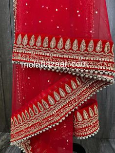 Heavy red bridal dupatta with gold sequins work and beads on the border. Color : Red Red Saree With Dupatta For Celebration, Diwali Celebration Shawl With Zari Work, Red Traditional Festive Dupatta, Festive Celebration Shawl With Zari Work, Festive Red Dupatta For Navratri, Red Traditional Wear With Dupatta For Celebration, Red Dola Silk Saree For Celebration, Red Saree With Dori Work For Reception, Red Choli For Wedding And Festival