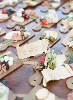 small wooden trays filled with different types of food