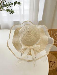 Add a touch of Boho Chic to your wardrobe with our Skinny Scarf Decor Straw Hat. This hat effortlessly combines style and function, featuring a decorative scarf for added flair. Enjoy the perfect blend of fashion and practicality with this must-have accessory. Color : White Material : Paper Size Crown one-size 58 Elegant Cream Hats For Beach Season, Elegant Cream Hat For Beach Season, Cream Beach Hat One Size, Beige Summer Hats One Size, Cream Summer Hat One Size, Elegant Beige Sun Hat One Size, Elegant Spring Hats One Size, Elegant Spring Hats, One Size Beige Sun Hat