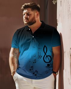 a man standing next to a wall with musical notes on his shirt and white pants