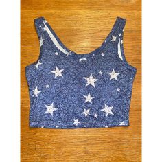 Womens Romwe Crop Tank Size-Small Condition-New Without Tags Features- 65% Polyester, 35% Cotton, Blue Crop Tank Top With White Stars Design, 15.5" Long (450) Trendy Blue Top With Star Print, Fitted Star Print Summer Tops, Trendy Blue Star Print Top, Fitted Star Print Tops For Summer, Fitted Blue Top With Star Print, Blue Star Print Summer Tops, Blue Star Print Tops For Summer, Fitted Sleeveless Top With Star Print, Blue Cotton Star Print Tops