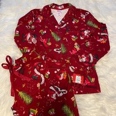 New With Tags Deep Red With Santa, Tree And Presents Pattern Matching Top And Bottom Clear Glitter Buttons On Top Tie Waist 100% Cotton Approximate Measurements (Laying Flat): Top: Armpit To Armpit: 19" Length: 24.5" Bottoms: Waist: 14" Rise: 9" Inseam: 28.5" Santa Tree, Target Holiday, Holiday Pajamas, Pattern Matching, Matching Top, Deep Red, Women's Intimates, Pajama Set, Pajamas