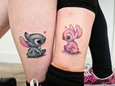 two people with matching tattoos on their legs, one has an elephant and the other has a dog