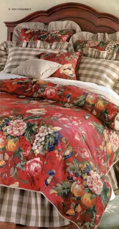 an image of a bed with flowers on the comforter and pillow cases in it