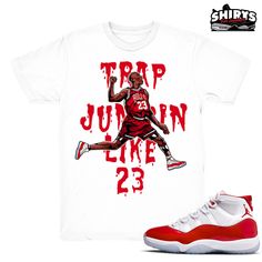 "Cherry Red 11s shirt designed by Shirts4Sneakers to match the Retro Jordan 11 Cherry holiday sneaker release. \"Trap Jumpin\" - Cherry 11 Jordan Match T-Shirt design by: Shirts4Sneakers. Jordan 11 Cherry sneaker (DOES NOT) come with the t-shirt. [The sneaker is only intended to show the sneaker match] 100% Ring-spun Cotton - ( Gildan Softstyle Tee ) (Our custom Sneaker Match Shirts & Hoodies fit true to size.) Shirts4Sneakers is not affiliated with Jordan Brand or Nike. Please visit our FAQs se Red Sporty Sublimation Design For Streetwear, Red Sublimation Design T-shirt With Graphic Print For Streetwear, Casual Red Sublimation Design For Streetwear, Red Casual Sublimation Design For Streetwear, Red Graphic Print Sneakers For Streetwear, Red Graphic Print Sublimation Design For Streetwear, Red Sublimation Design Graphic Print Streetwear, Casual Streetwear Sublimation Design For Sports Season, Cherry Red 11s