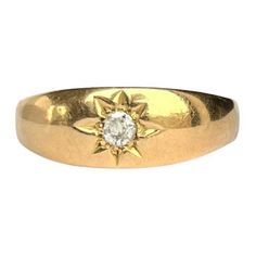 This classic style band is modelled in 9carat gold and the old mine cut diamond which is set in the star setting measures 20pts. Size: U or 10 Width: 7.5mm Weight: 4.8g Classic Yellow Gold Star-shaped Diamond Ring, Classic Star-shaped Formal Jewelry, Classic Star-shaped Diamond Anniversary Ring, Classic Star-shaped Diamond Ring, Classic Star-shaped Jewelry With Single Diamond, Classic 14k Gold Star-shaped Diamond Ring, Gold Star-shaped Diamond Ring For Formal Occasions, Classic Star-shaped Ring For Formal Occasions, Starburst Diamond Ring