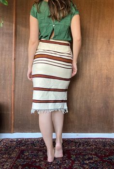 "This beautiful cotton blanket skirt is in excellent vintage condition with virtually no flaws to be seen. We adore the small tassel fringe along the bottom and the side slits, measuring 7 inches on either side. This skirt has a zipper closure, and is a linen cotton blend. It sits pretty high waisted on our model, who is between a women's small and medium, and is about 5'8\". 29\" waist 25\" long" Bohemian Fitted Pencil Skirt, Bohemian Lined Pencil Skirt, Blanket Skirt, Vintage Blanket, Womens Skirts, Cotton Blanket, Woven Blanket, Stripe Skirt, Tassel Fringe