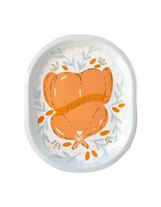 a paper plate with an orange bear on it