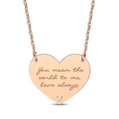 Reveal your love language with this romantic heart necklace. Your sentiment is conveyed on a heart-shaped pendant. A single round-cut diamond accent lends sparkle to the base of the design. Crafted in 14K rose gold, the pendant suspends centered on an 18-inch rope chain that secures with a spring ring clasp and is adjustable from 16 to 18 inches. Rose Gold Diamond Heart Pendant Necklace, Valentine's Day Rose Gold Diamond Necklace, Rose Gold Diamond Heart Necklace With Charm, Rose Gold Diamond Necklaces For Valentine's Day, Rose Gold Diamond Necklace For Anniversary Gift, Engraved Rose Gold Heart Necklace For Valentine's Day, Rose Gold Engraved Heart Necklace For Anniversary, Personalized Rose Gold Heart-cut Necklace, Personalized Rose Gold Heart Cut Necklace