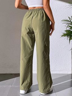 Stay effortlessly stylish with our Casual Plain Cargo Cropped Pant. These pants feature a cropped length and a clean, plain design, offering a versatile and contemporary style. With a relaxed fit and comfortable fabric, they are perfect for casual and everyday wear. These cargo cropped pants are a must-have addition to your wardrobe for a trendy and laid-back look.Specification: Style: Casual Pattern Type: Plain Type: Cargo Pants Closure Type: Elastic Waist Details: Pocket Waist Line: Natural Le Relaxed Fit Solid Cargo Pants, Solid Color Relaxed Fit Cargo Pants, Casual Plain Pants For Work, Casual Plain Workwear Pants, Relaxed Fit Cargo Wide Leg Pants, Non-stretch Solid Bottoms For Streetwear, Relaxed Fit Parachute Cargo Pants, Spring Utility Sweatpants With Relaxed Fit, Spring Utility Style Relaxed Fit Sweatpants