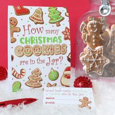 ginger cookies are in the jar next to a christmas card