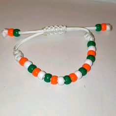 Nwot! Handmade Irish Bead Bracelet. Handcrafted In Ny, Usa. Unisex. One Size Fits Most. In The Colors Of The Flag Of Ireland. Plastic Beads And 550 Cording With A Well Woven Sliding Knot Enclosure. White Bracelets With Round Wooden Beads, Adjustable White Beaded Bracelets With Wooden Beads, Handmade Adjustable White Beads, Handmade White Casual Beads, Adjustable White Friendship Bracelets With Large Beads, Casual Cream Beaded Bracelets As Gift, Adjustable White Friendship Bracelet With Large Beads, White Letter Beads Bracelets For Crafting, Casual White Jewelry With Wooden Beads