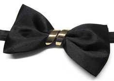 Beautiful silk pre-tied and adjustable double tiered banded bow tie. Will adjust from 13" through 19" neck. Bow dimensions 2.5" x 4.5". Chic Satin Bow For Formal Occasions, Elegant Butterfly Knot Bow For Black Tie Events, Adjustable Satin Bow Tie For Parties, Adjustable Decorative Bow For Black Tie Events, Chic Satin Bow Tie For Black Tie Events, Chic Black Tie Bow Tie With Satin Bow, Adjustable Butterfly Knot Ties For Parties, Adjustable Satin Bow For Evening, Formal Adjustable Bow With Bow Tie Back