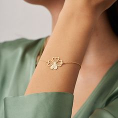 🍀✨ Discover Luck and Elegance with Our Four Leaf Clover Initial Bracelet! ✨🔠 Unveil a world of charm and fortune with our enchanting Four Leaf Clover Initial Bracelet! 🌈 Crafted with precision and adorned with a touch of luck, this bracelet is more than just a piece of jewelry - it's a symbol of positivity and personal style. 💖 ✨ Key Features: 🍀 Luck Meets Style: Embrace the essence of luck with our delicately designed four-leaf clover paired with your chosen initial. It's the perfect blend of charm and personalization. 🌟 Versatile Elegance: Elevate your everyday style or add a touch of luck to special occasions. This bracelet effortlessly complements any outfit, making it a wardrobe essential. 🌈 High-Quality Craftsmanship: Meticulously crafted to ensure durability and a timeless ap Elegant Sterling Silver Heart Name Bracelet, Elegant Personalized Sterling Silver Bracelet For Valentine's Day, Four Leaf Clover Bracelet, Gold Sterling Silver Heart Bracelet For Friendship, Elegant Sterling Silver Heart Bracelet For Friendship, Heart-shaped Jubilee Bracelet Jewelry As Gift, Gold Heart-shaped Jubilee Bracelet Gift, Elegant Heart-shaped Name Bracelet Gift, Elegant Heart-shaped Name Bracelet