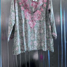 Silky Summer Weight Tunic With Embroidery. New With Tags. Pit To Pit 2”. 3 Button Closure. Poly Silk Made In India. Machine Wash Cold And Hang To Dry. Very Comfortable And Pretty. Traditional Floral Print Tops With Relaxed Fit, Green Blouse With Floral Embroidery And Relaxed Fit, Traditional Long Sleeve Tops With Floral Print, Green Tunic Blouse With Floral Embroidery, Green Long Sleeve Tunic With Floral Print, Casual V-neck Kurta With Floral Print, Traditional Green Floral Print Top, Green Long Sleeve Tunic With Floral Embroidery, Casual Embroidered V-neck Kurta