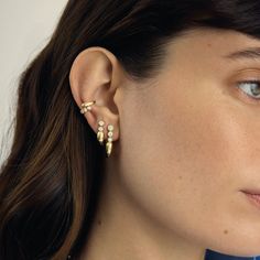 The Pia cuff wraps around your ear, creating the illusion of a captivating earring with a head of diamonds and a tail of bold, generous gold. Its unique design combines elegance and statement, making it perfect for adding a touch of luxury to your look. The Pia cuff pairs beautifully with the Mini Forte earring and the Forte earring, creating a layered, contemporary style. Being Perfect, Earring Stud, To Shine, Daily Look, Gold Hoop, Everyday Style, Ring Bracelet, Bezel Setting, Earring Necklace