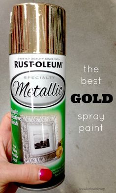 a person is holding a spray paint in their hand and it says rust oleeum the best gold spray paint