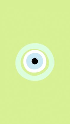 an eyeball is shown in the middle of a green background