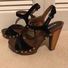 Miu Miu Black Velvet Mettalic Studded Metal Plated Heel Size 7.5 But The Size Is Not Indicated. They Are My Size. The Size Was On The Box Which They Don’t Come With. They Are Studded At The Sides And Never Worn Just To Try On But They Are A Little Marked Up And The Heel Plate Is A Little Bent In Some Spots. I’ll Give Them To You For A Special Price. Black Studded Sandals For Evening, Black Leather Sandals With Gold Studs, Black Open Toe Sandals With Gold Studs, Black Studded High Heel Sandals, Black Heels With Wooden Heel For Parties, Black Wooden Heel Party Heels, Black Party Heels With Wooden Heel, Gold Heels With Wooden Heel For Party, Leather Heels With Gold Studs For Party