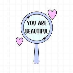 a magnifying glass with the words you are beautiful on it and hearts around it