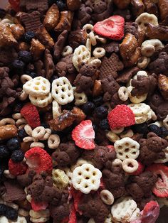 a bowl filled with cereal and other snacks