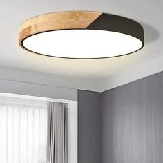 a circular light fixture in a room