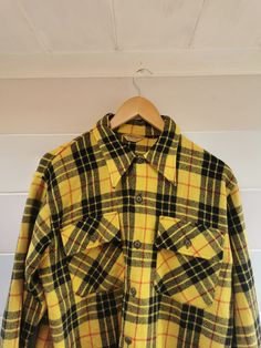 ~Rare 1950s Pilgrim Flannel ~True vintage ~100% cotton  ~Warm yellow and black tartan check ~In very good vintage condition.  A small mark on the front and a very small hole at the back (pictured) ~Measurements 27.5 length  22 inches pit to pit Estimated UK large Vintage Plaid Cotton Flannel Shirt, Retro Plaid Flannel Shirt For Fall, Retro Plaid Flannel Shirt With Buttons, Vintage Plaid Flannel Shirt For Fall, Vintage Plaid Flannel Shirt With Pockets, Vintage Plaid Flannel Shirt With Button Closure, Vintage Collared Flannel Shirt For Fall, Vintage Long Sleeve Flannel Shirt, Vintage Plaid Flannel Shirt