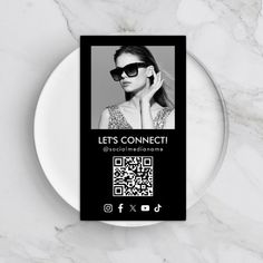 a white plate with a black and white photo on it that says let's connect