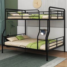 a bunk bed with two sets of mattresses on the bottom and one is green