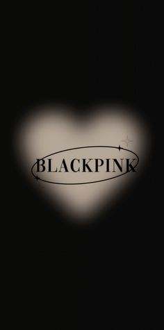 the word blackpink is written on a heart shaped object with an arrow in it