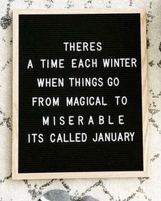 a sign that is on the side of a wall saying there's a time each winter when things go from marginal to miserablely it's called january